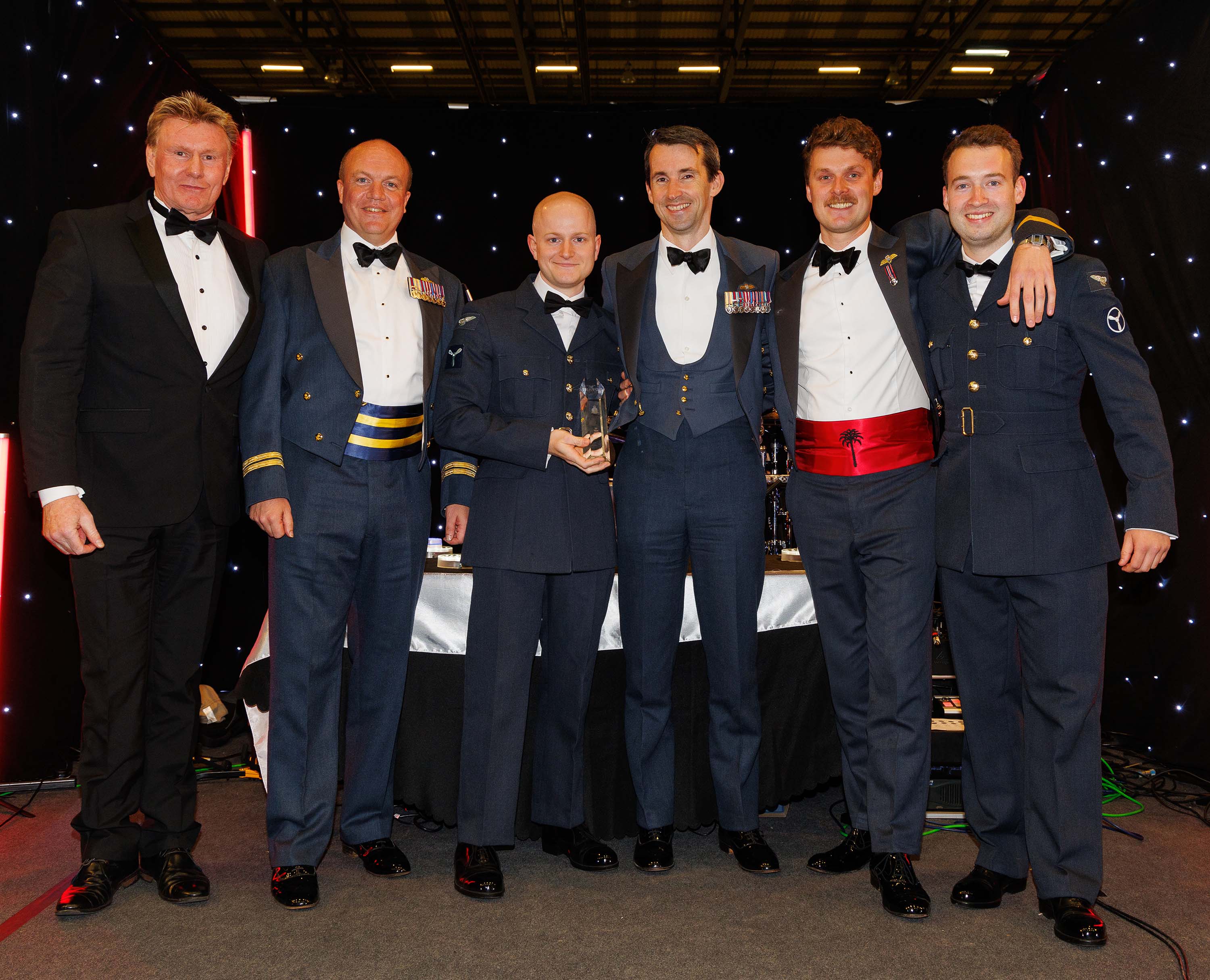 Photo: Image shows members of 1312 after having received the Top Team Award
